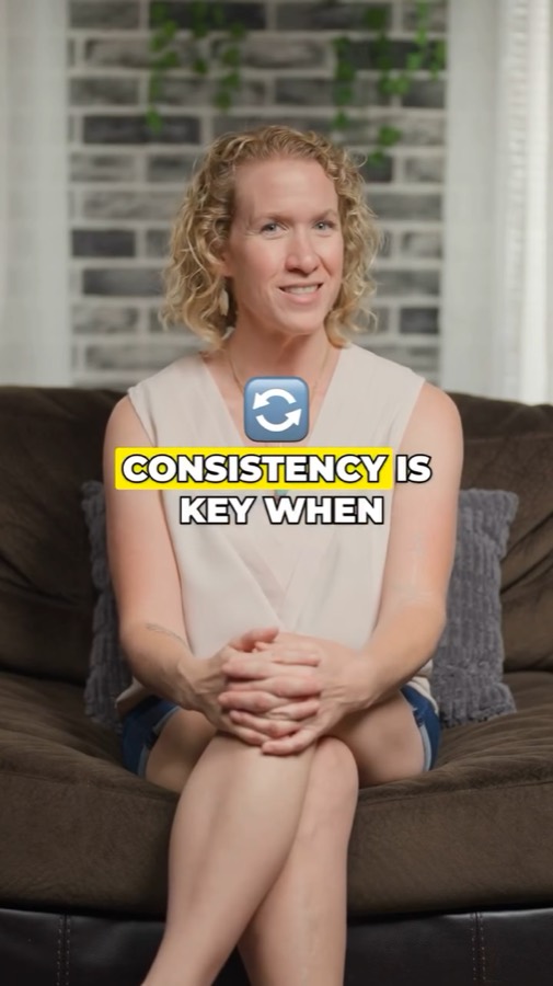 Heather smiling on a studio couch with the caption Consistency is key when